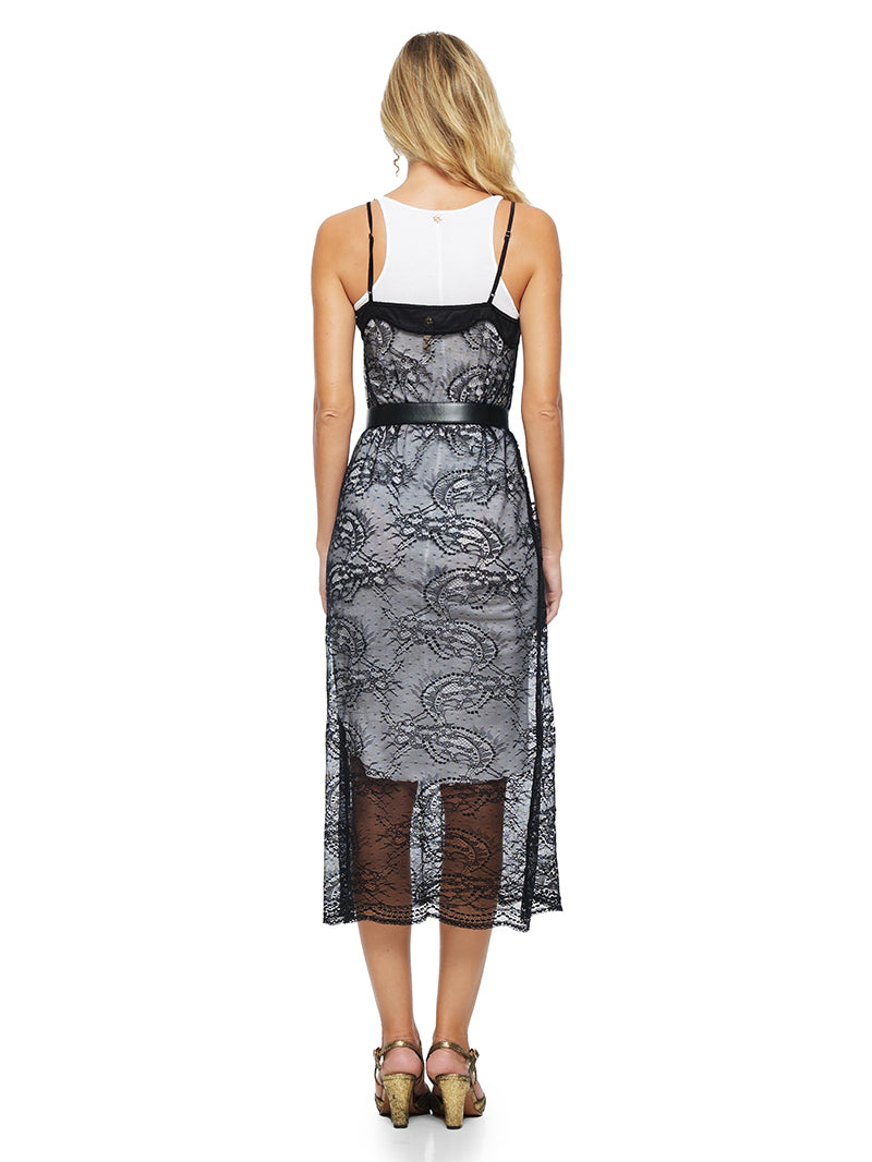 Flora Midi dress in black, styled with Freya dress, Snake belt and Margot heels, back view - worn by model