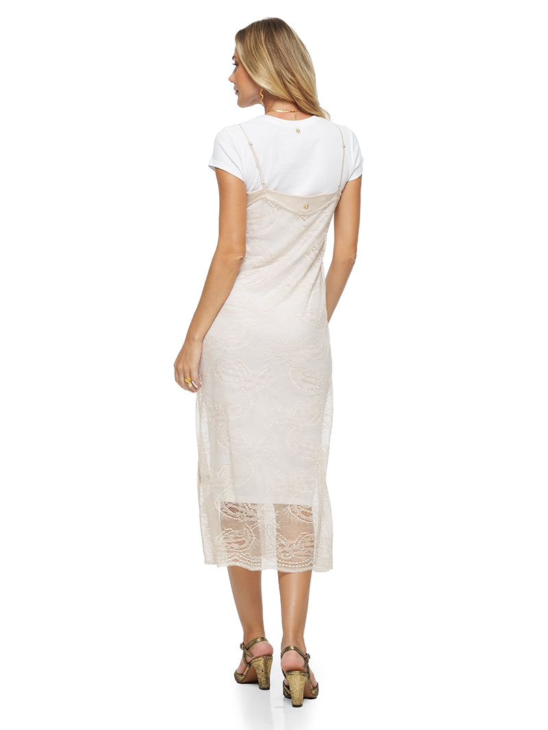 Flora Midi dress in Titanium color, styled with Fama dress, and Margot heels, back view - worn by model