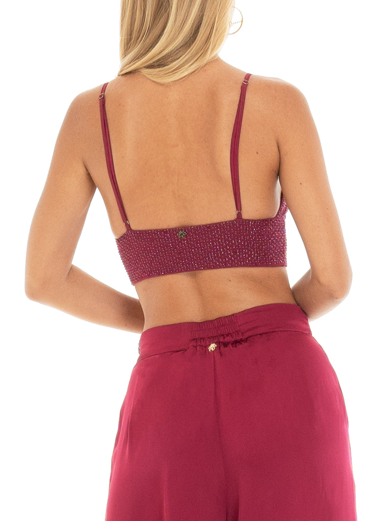 Fabi top in cherry color, side view - worn by model