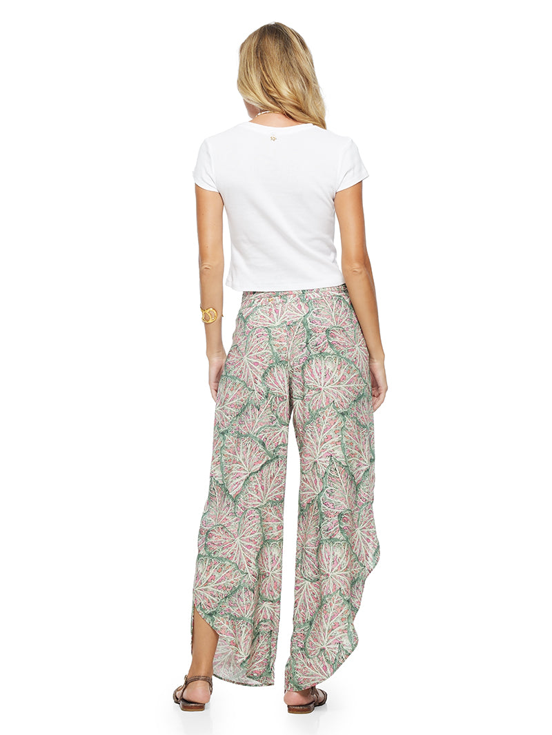 Fama Top, cotton t-shirt in white color, styled with Dalia pants and Margot flats, back view - worn by model