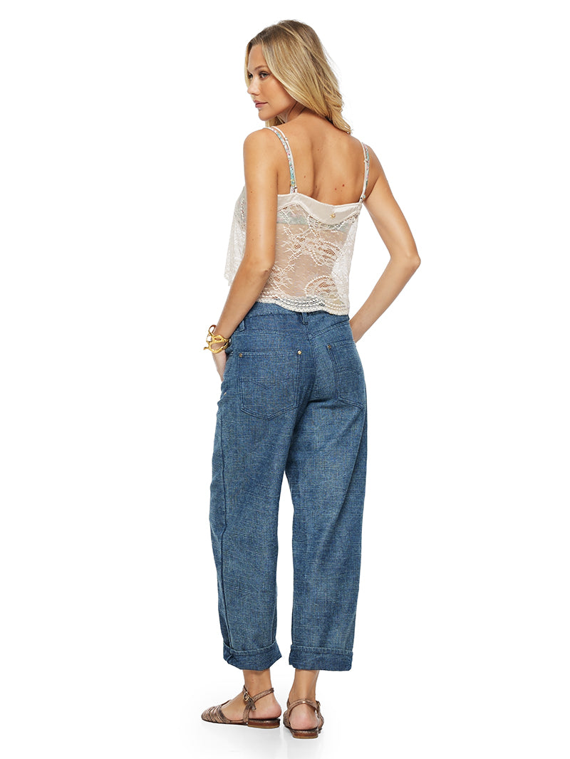 Flora top in Titanium color, styled with Cala bikini top and Baggy Daddy jeans, back view - worn by model