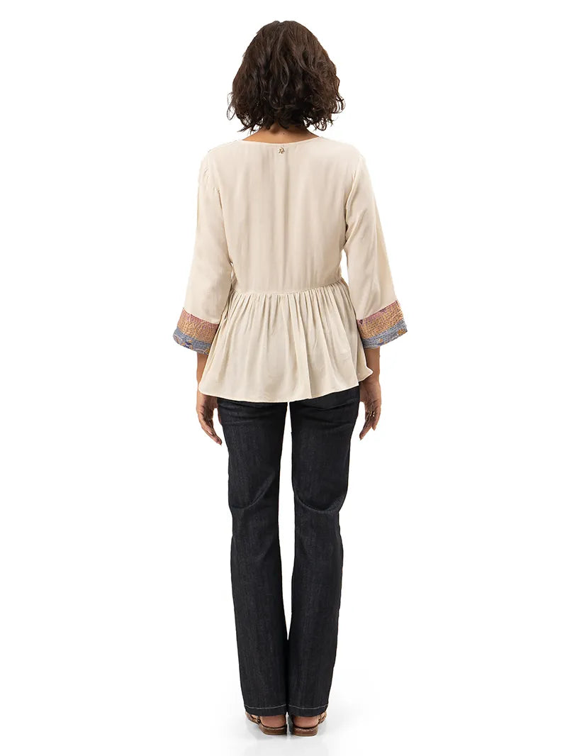 Kali patchwork tunic top styled with Janis jeans and Margot flats, back view - worn by model