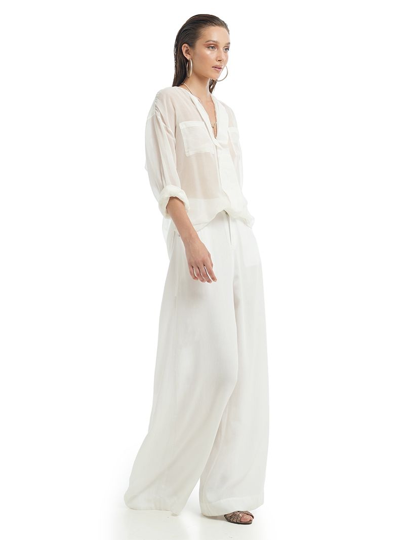Silk cotton shirt in Natural color styled with Rua pants and Margot heels, side view - worn by model