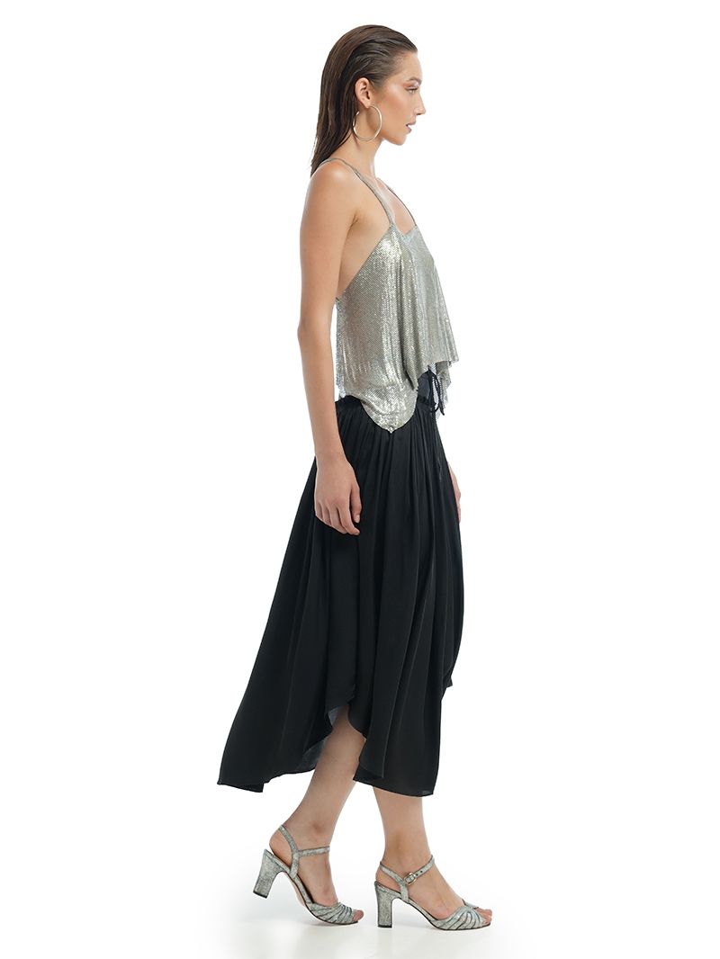 Alina black midi skirt styled with Lame silver tank top and Margot heels, side view - worn by model