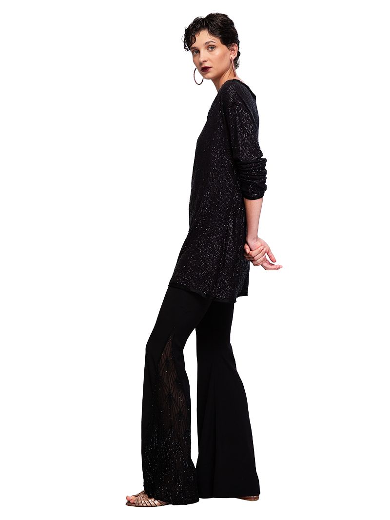 Hendrix bell bottom pants styled with Nyx beaded mini dress and Margot flats, side view - worn by model