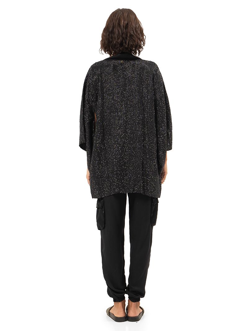 Geisha black hand-beaded outer kimono styled with Apollo snake green bikini and black Cargo pants, back view - worn by model
