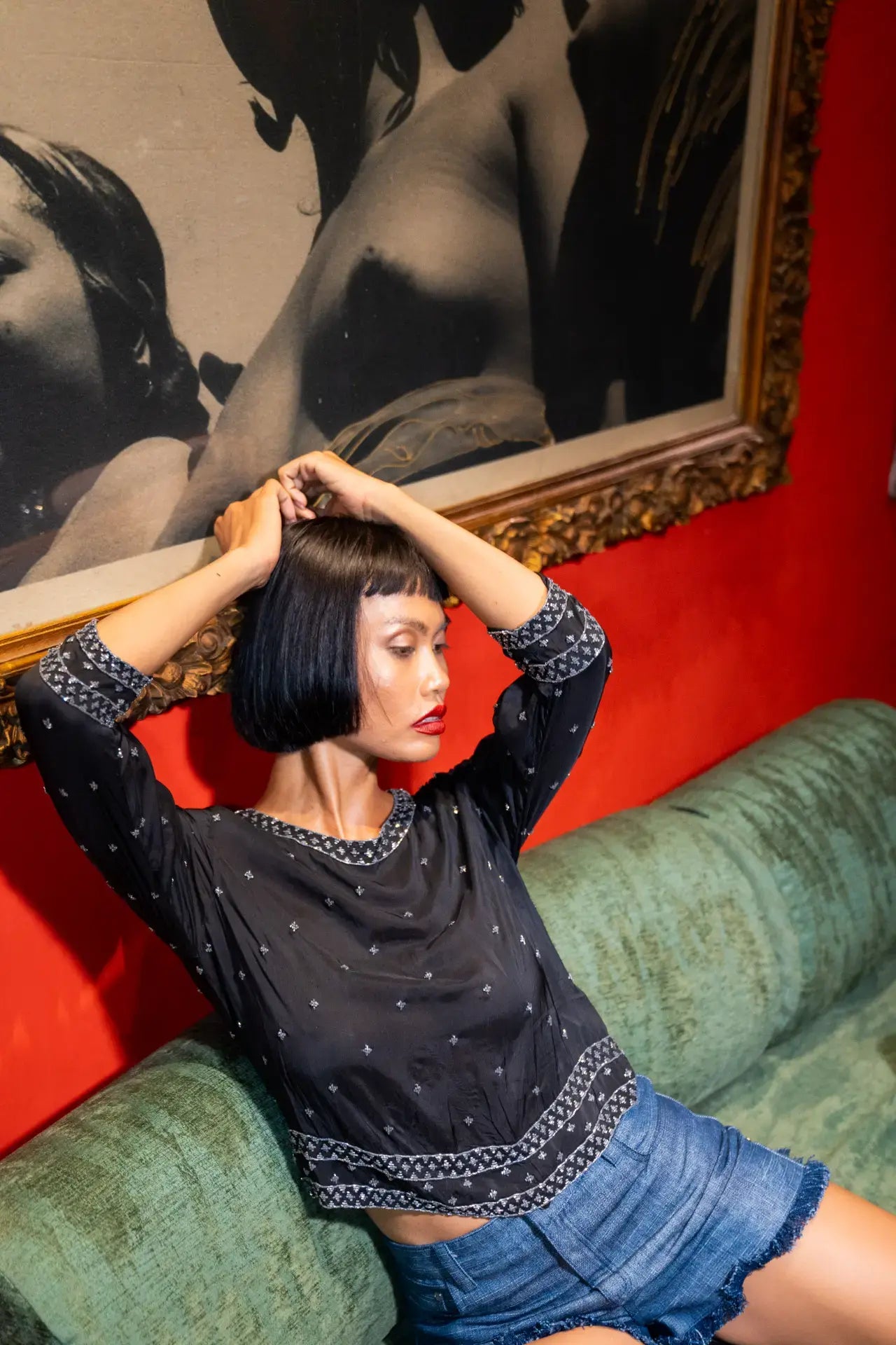 Baggy Daddy jean shorts styled with Giselle black top, front view - worn by model