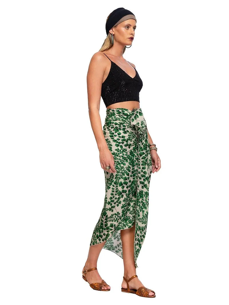 Hendrix beaded crop top styled with Fern sarong and Margot flats, side view - worn by model