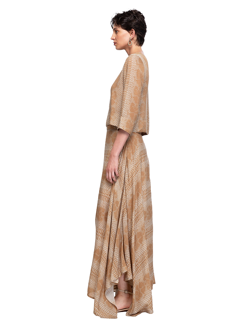 Oya top in taupe snake print, styled with Oshun maxi skirt, side view - worn by model