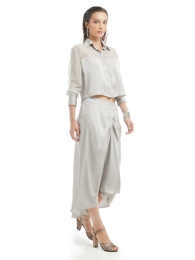 Josie Shirt in Light Grey, styled with Alya Skirt and Margot Heels, side view - worn by model