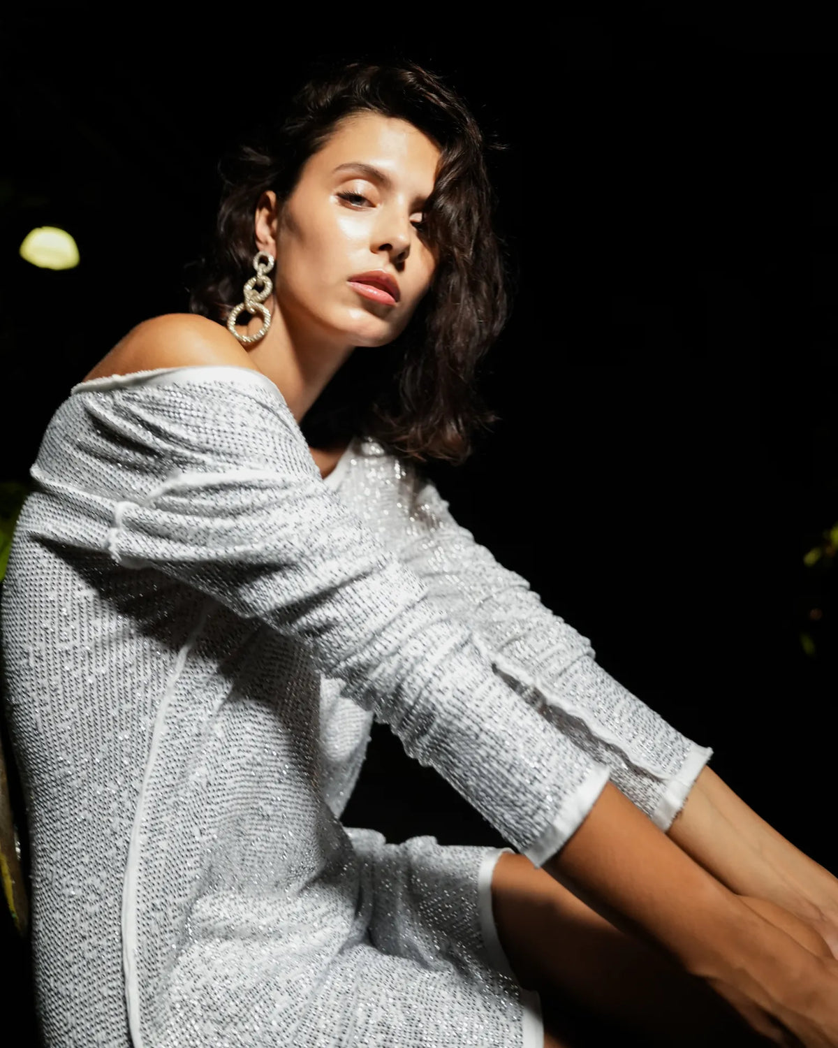 Nyx mini dress in white and silver sequins, side close view - worn by model