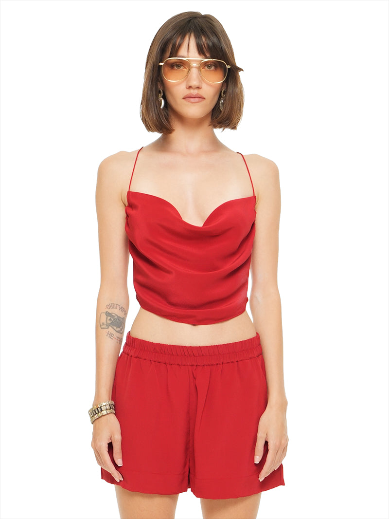 Caravan shorts in red styled with Maz top, front view - worn by model