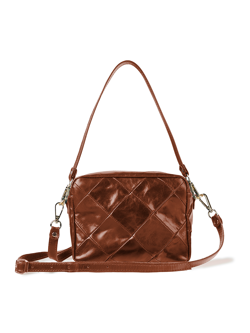 Rimba leather shoulder bag with a diamond-quilted pattern, featuring matching detachable shoulder and crossbody straps with gold-tone hardware - ghost front view