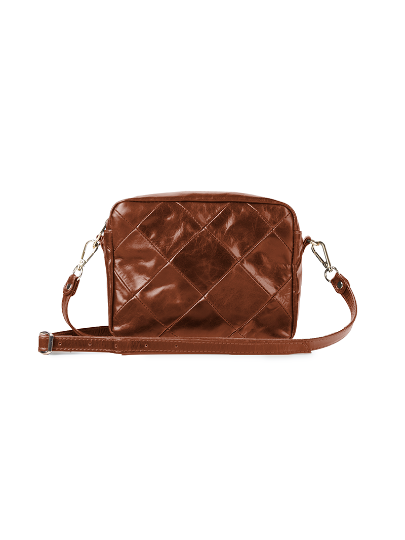 Rimba leather shoulder bag with a diamond-quilted pattern, featuring matching detachable shoulder and crossbody straps with gold-tone hardware - ghost front view