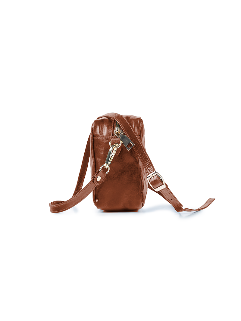 Rimba leather shoulder bag with a diamond-quilted pattern, featuring matching detachable shoulder and crossbody straps with gold-tone hardware - ghost side view