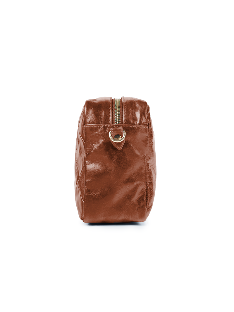 Rimba leather shoulder bag with a diamond-quilted pattern, featuring matching detachable shoulder and crossbody straps with gold-tone hardware - ghost side view