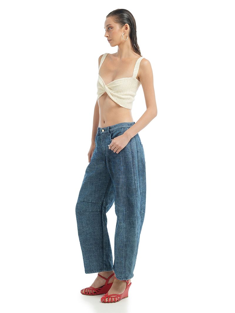 Alix Top Vanilla styled with Catch Barrel Jeans, side view - worn by model