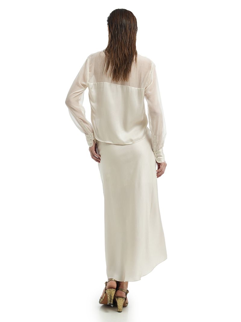 Josie top in Vanilla styled with Alya Skirt and Margot heels, back view - worn by model