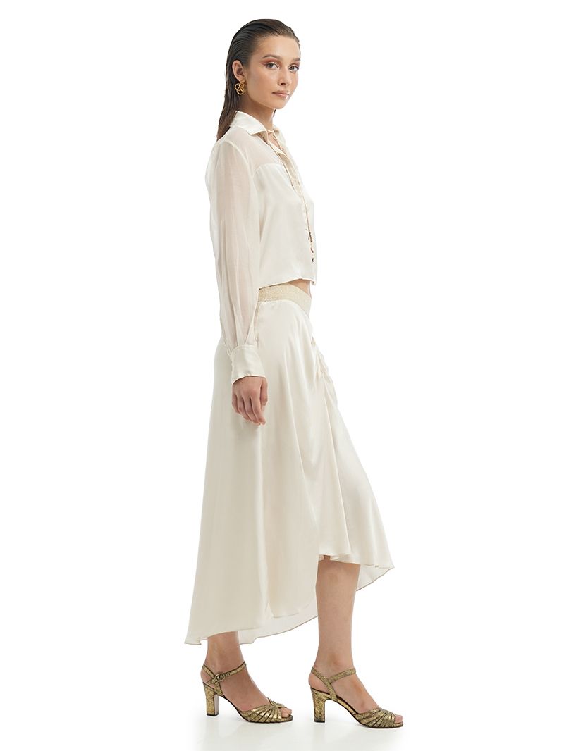 Josie top in Vanilla styled with Alya Skirt and Margot heels, side view - worn by model