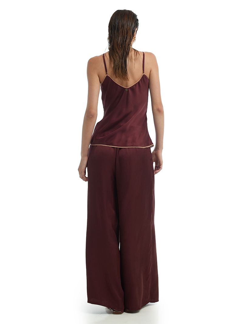 Melody top in Wine color, styled with Lisa pants and Margot flats, back view - worn by model
