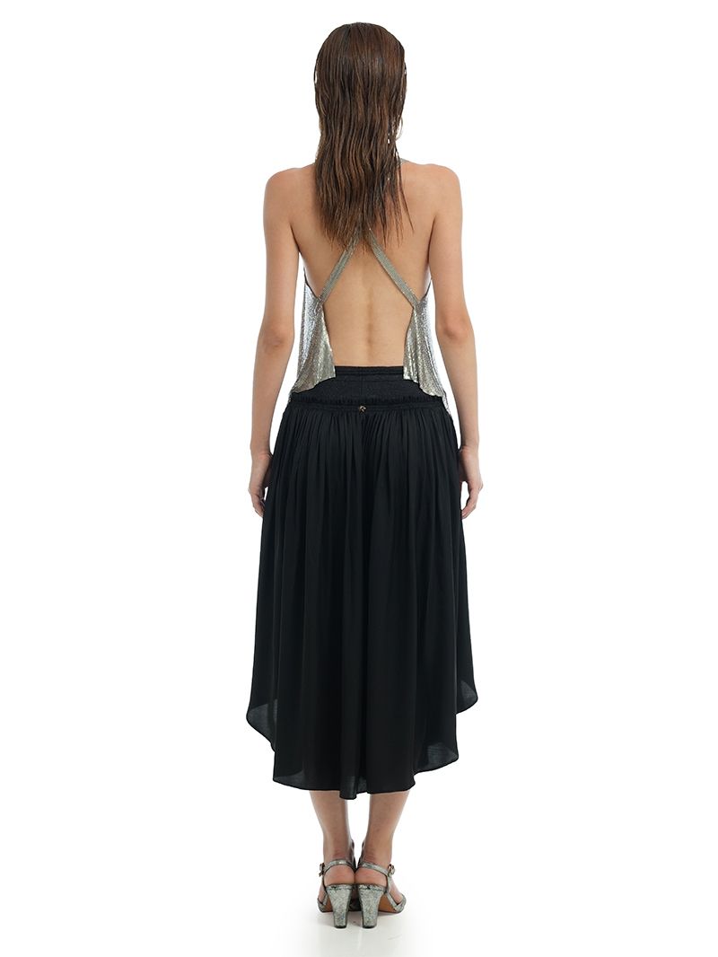 Alina black midi skirt styled with Lame silver tank top and Margot heels, back view - worn by model