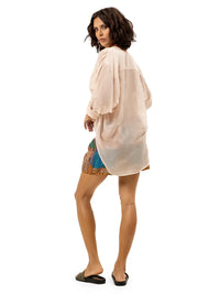 Arya shorts styled with Silk shirt and Flaviana slides, back view - worn by model