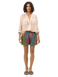 Arya shorts styled with Silk shirt and Flaviana slides, front view - worn by model
