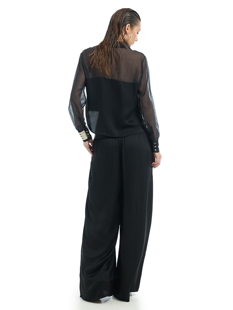 Nova wide leg black pants, styled with Josie Shirt in black, back view - worn by model