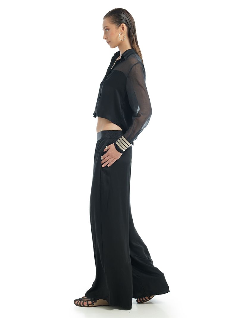 Nova wide leg black pants, styled with Josie Shirt in black, side view - worn by model