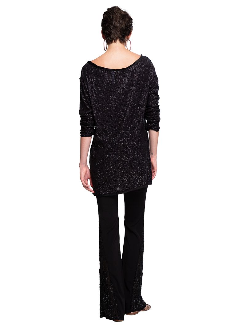 Hendrix bell bottom pants styled with Nyx beaded mini dress and Margot flats, back view - worn by model