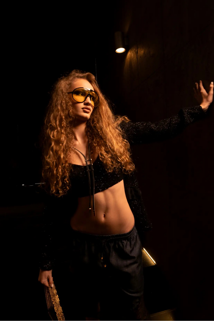 Fabi Top black styled with black blazer and Mora shorts, front view - worn by model
