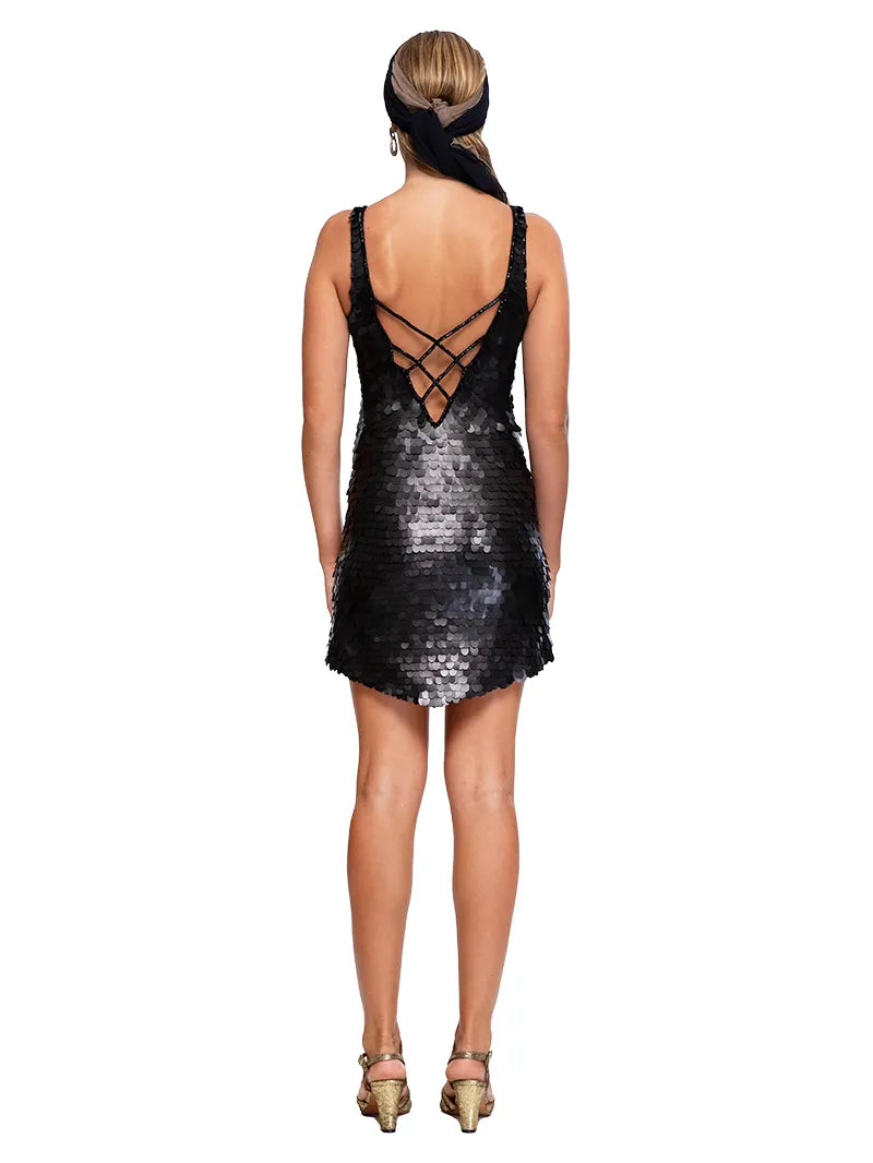 Prague sequin mini dress in black styled with Margot heels, back view - worn by model