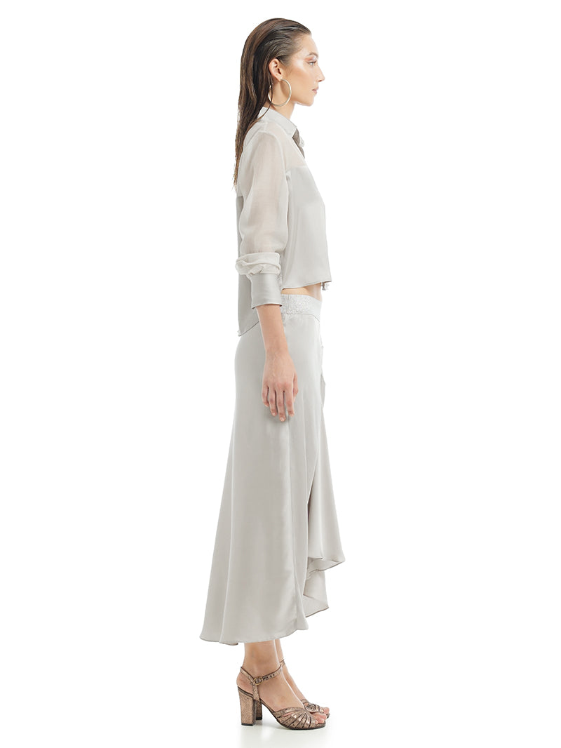 Alya Midi Skirt in light grey, styled with Josie top and Margot Heels, side view - worn by model