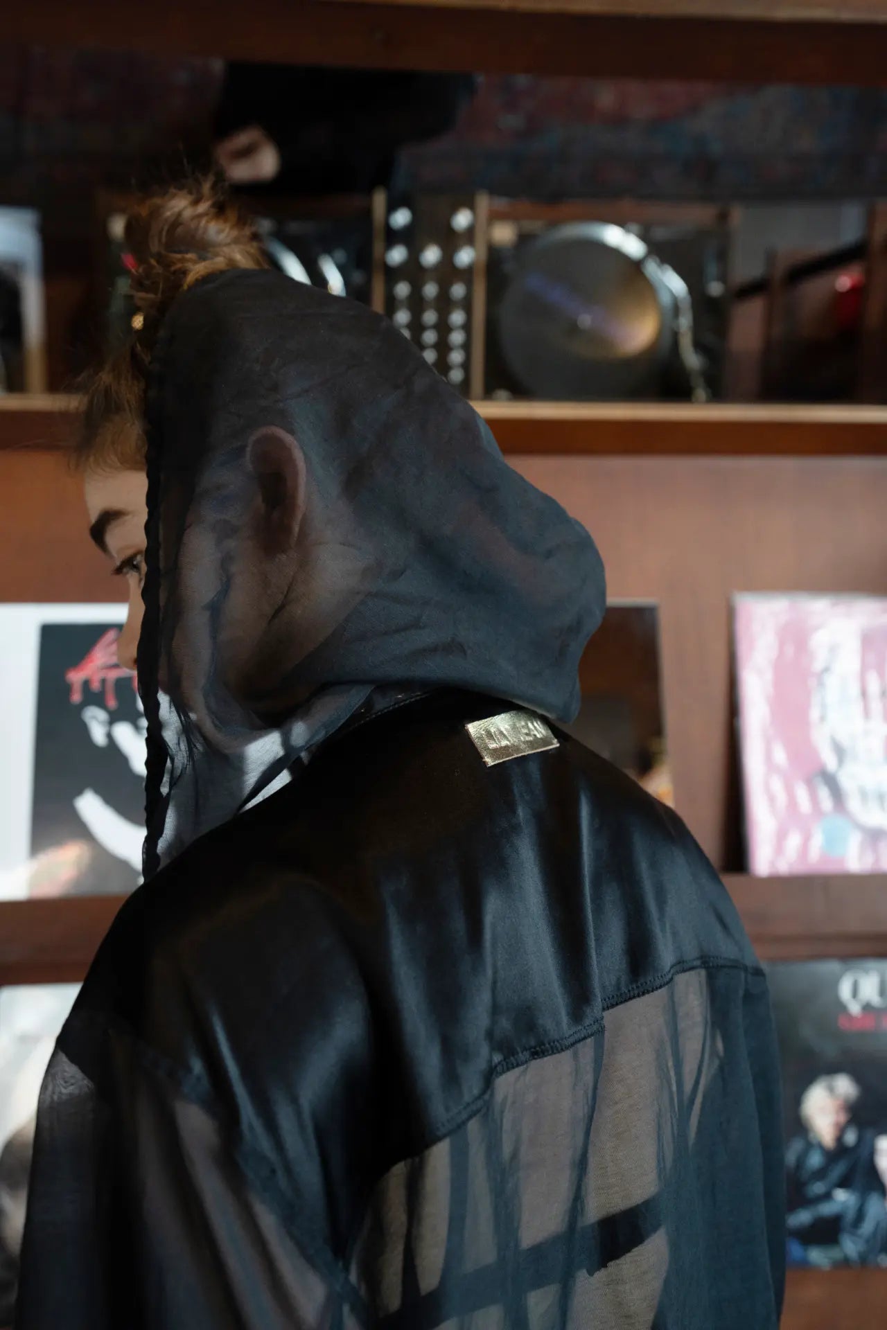 Sheer bomber black jacket, back view  - worn by model