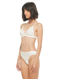 Alegra underwear in natural color, quarter front view - worn by model
