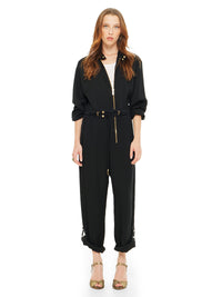 Berlin black jumpsuit styled with white t-shirt and Margot heels, front view - worn by model
