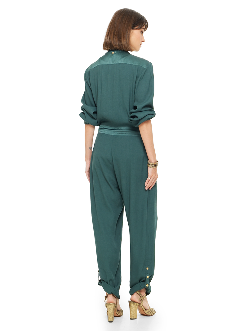 Berlin jumpsuit in pine green color styled with Margot heels, back view - worn by model