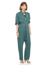 Berlin jumpsuit in pine green color styled with Margot heels, quarter front view - worn by model