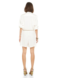 Berlin playsuit in natural color styled with Hornet beaded top and Margot heels, back view - worn by model
