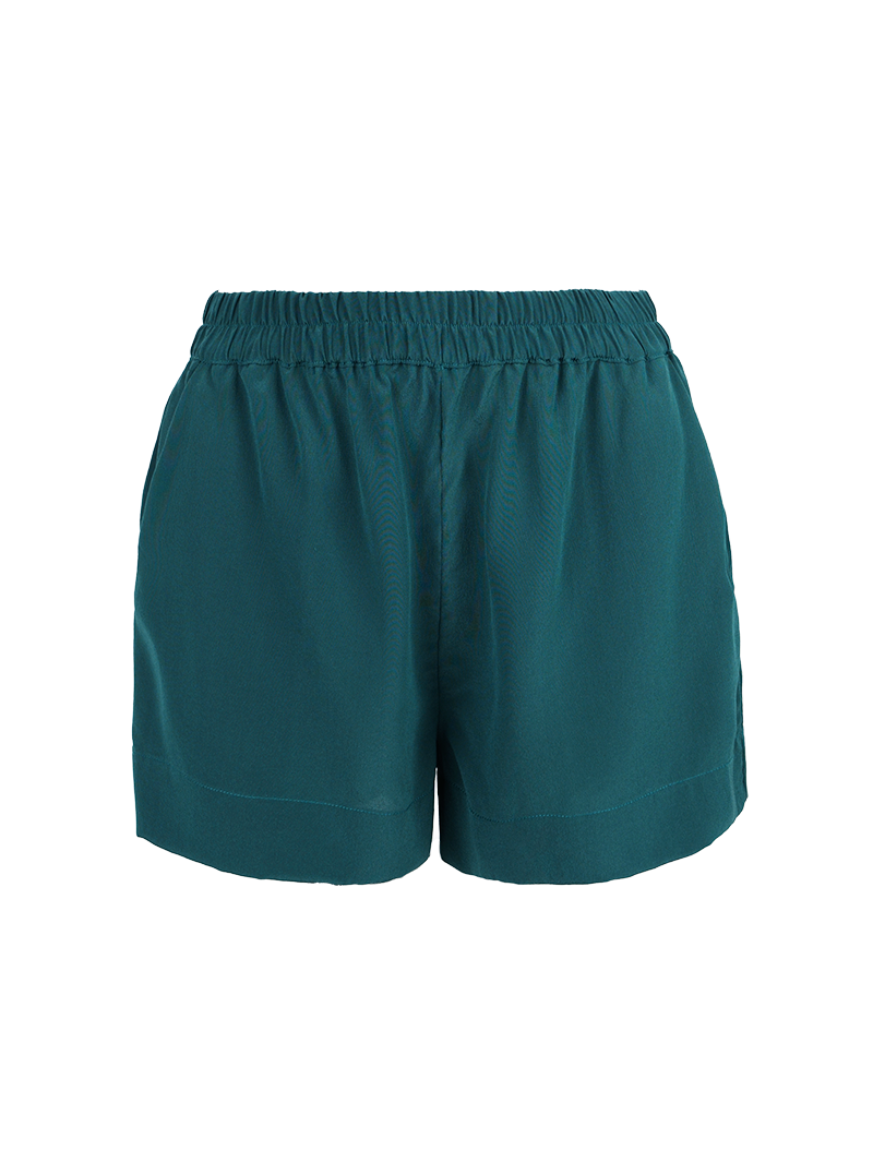 Caravan shorts in Pine Green - ghost front view