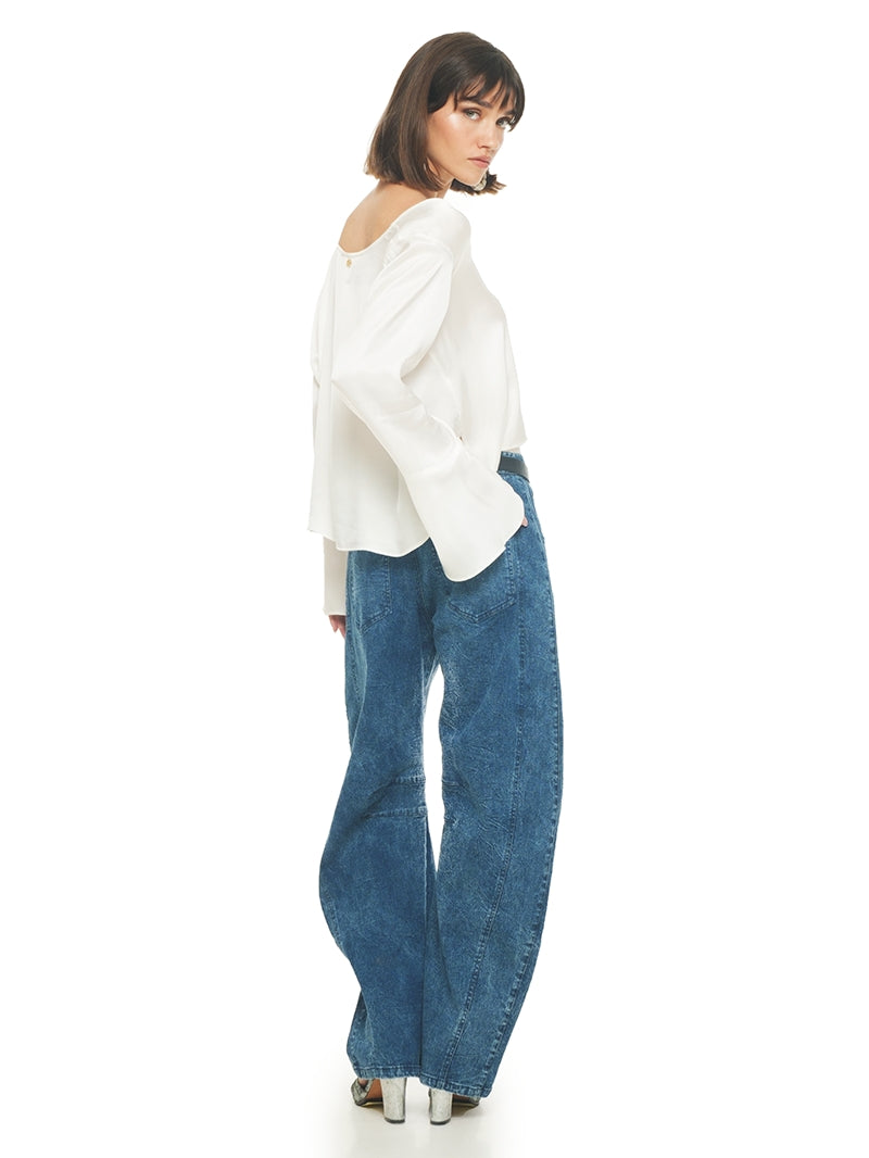 Catch jeans pants styled with Rama top and Margot heels, back right view - worn by model