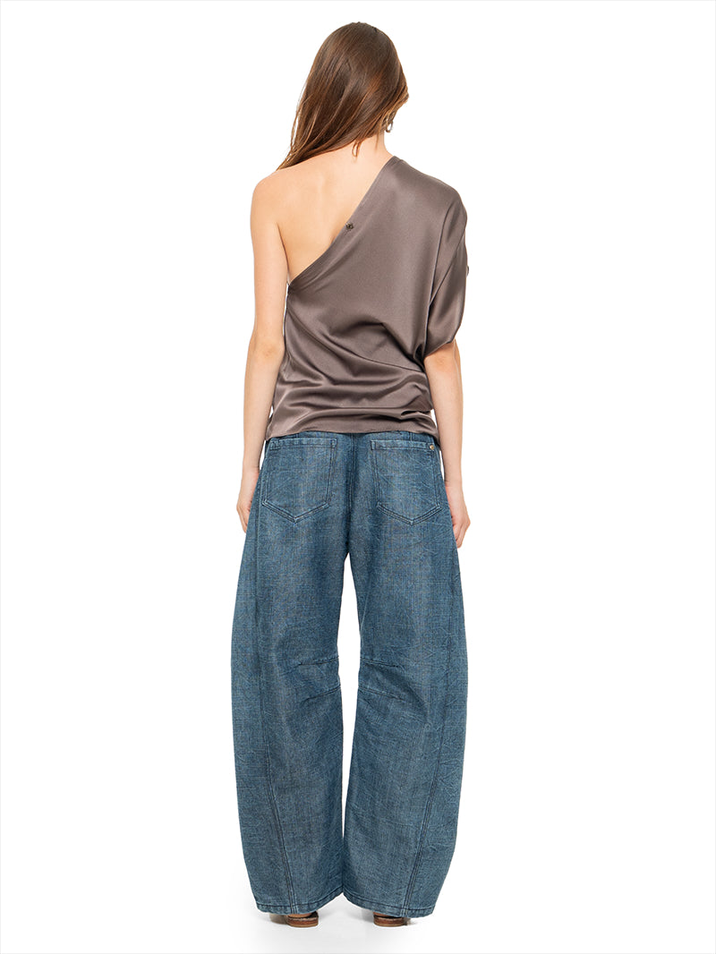 Ganesha top in elephant color, styled with Snap jeans pants, and Margot flats, back view - worn by model