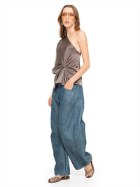 Ganesha top in elephant color, styled with Snap jeans pants, and Margot flats, quarter front view - worn by model
