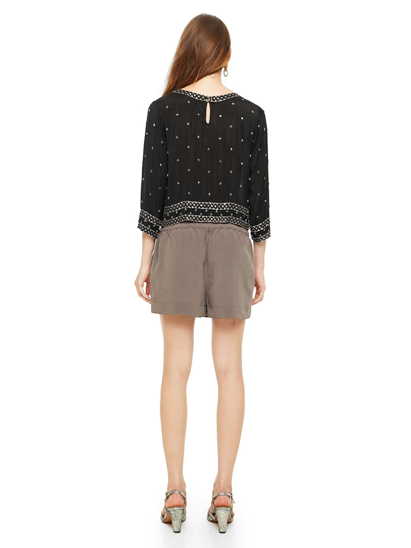 Giselle beaded top in black styled with Caravan shorts and Margot heels, back view - worn by model