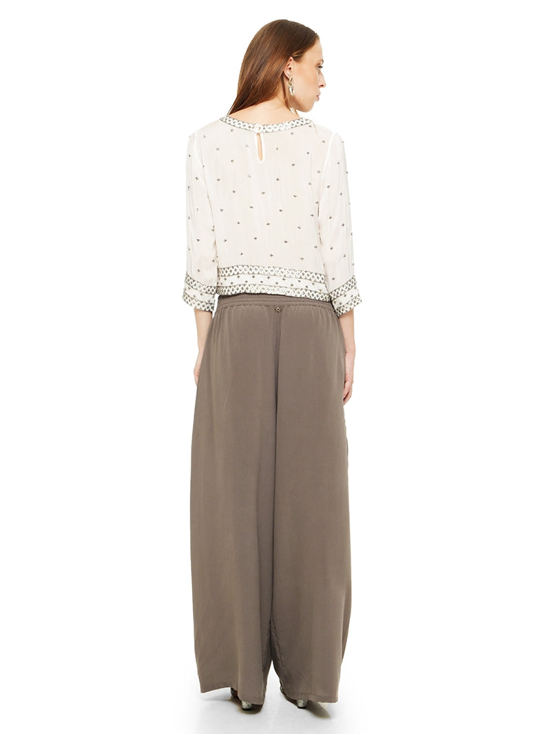 Giselle beaded top in natural color, quarter front view - worn by model