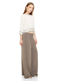 Giselle beaded top in natural, quarter front view - worn by model