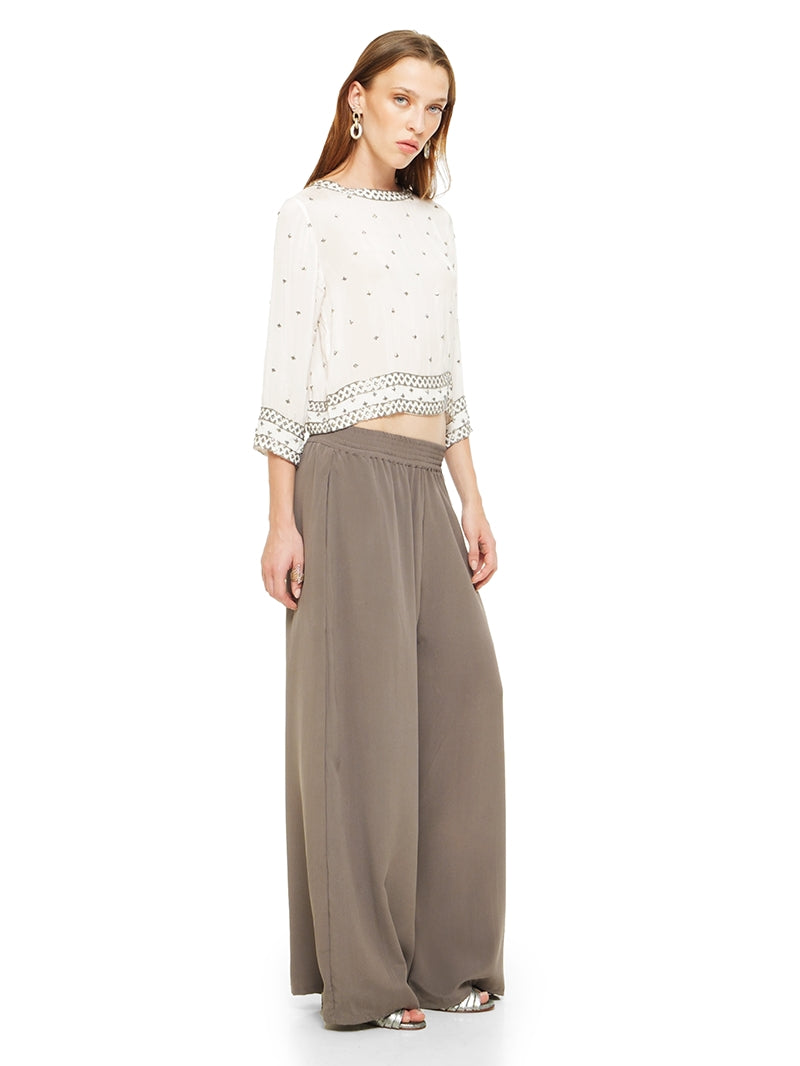 Giselle beaded top in natural, quarter front view - worn by model