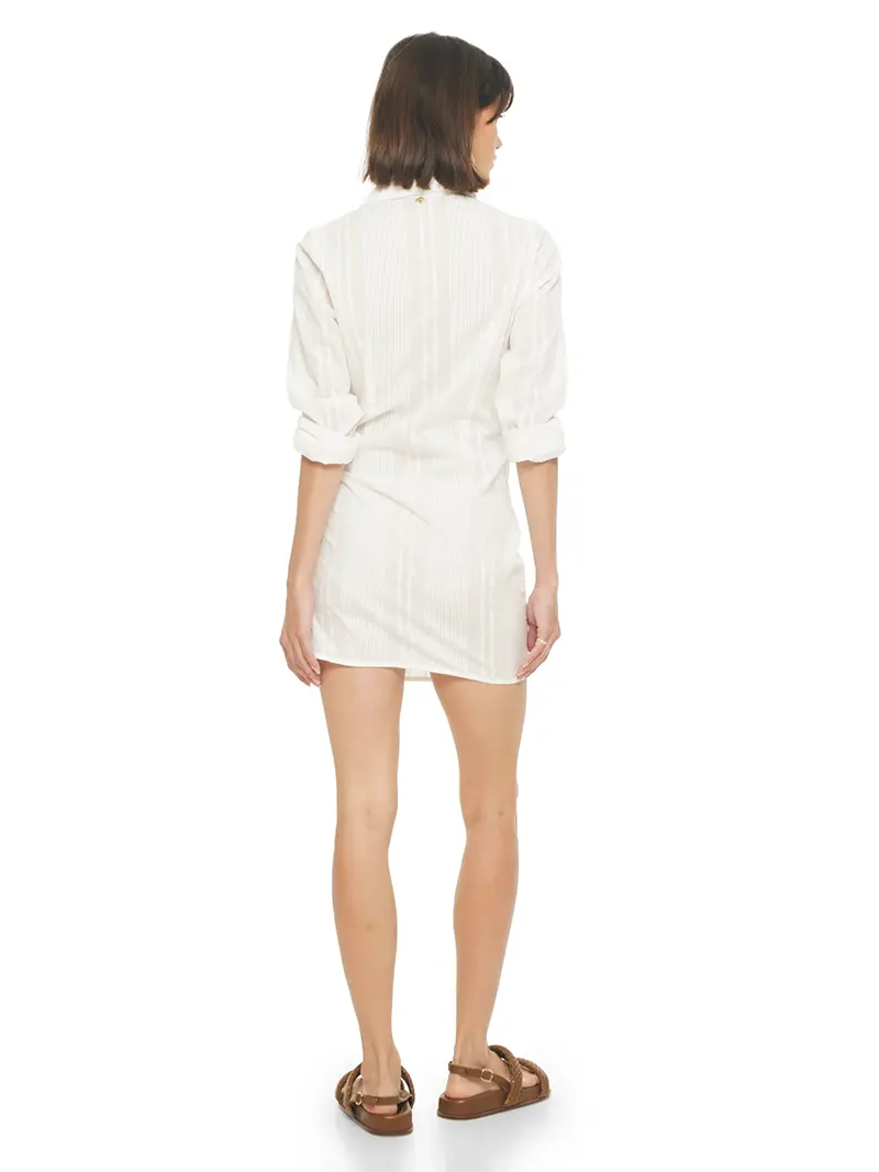 Kira mini wrap white dress styled with Charlie flats, back view - worn by model