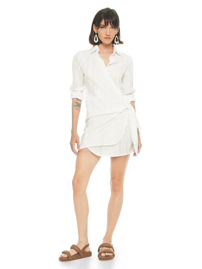 Kira mini wrap white dress styled with Charlie flats, front view - worn by model