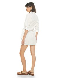 Kira mini wrap white dress styled with Charlie flats, side view - worn by model